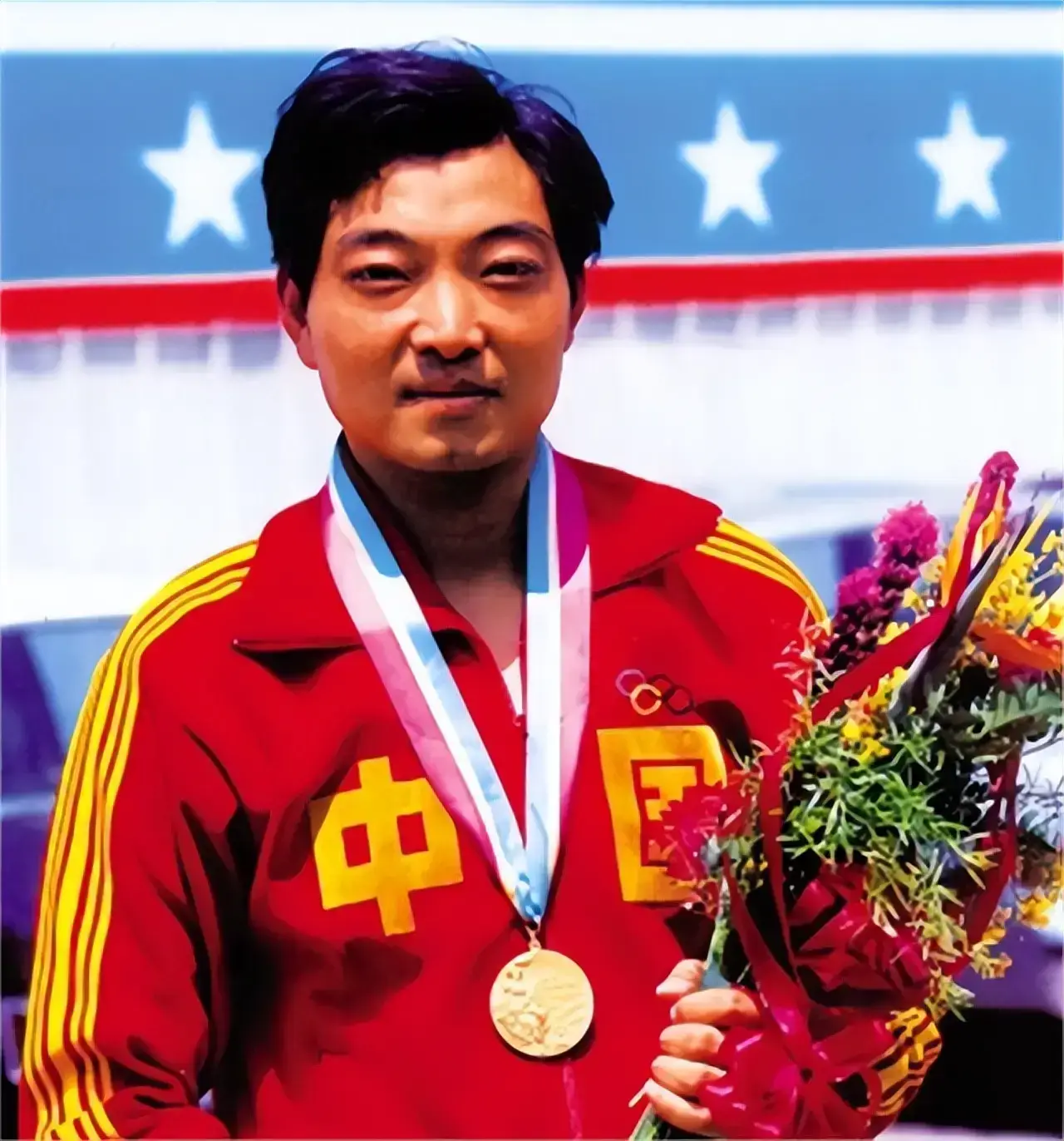 Xu Haifeng on the podium after winning China's first Olympic gold medal at the 1984 Los Angeles Olympics
