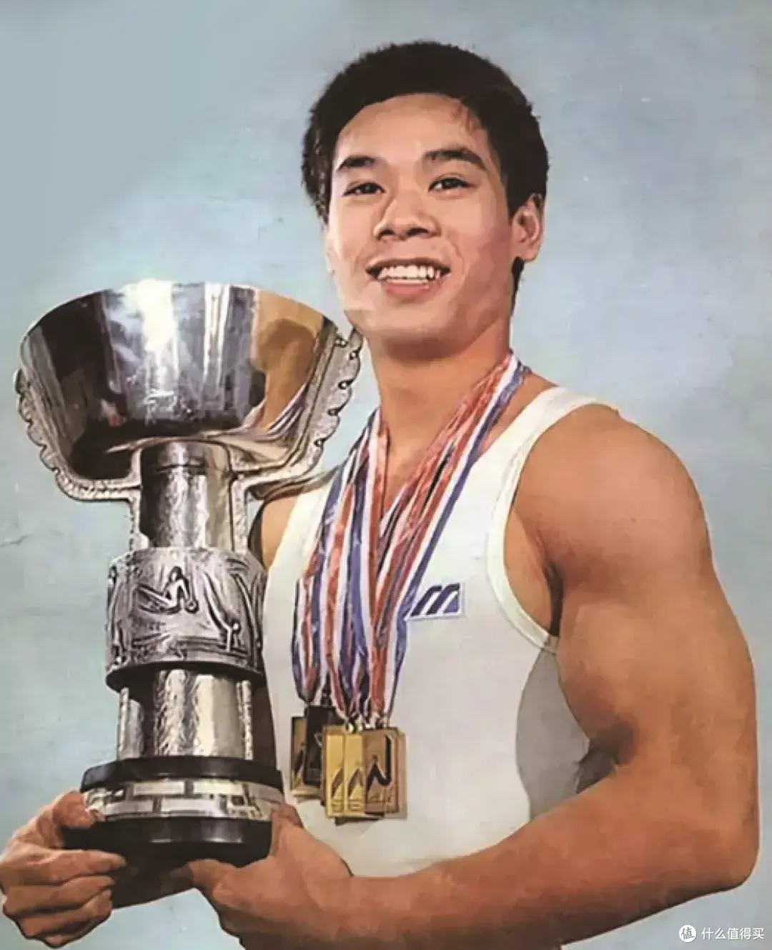 A young Li Ning holding a trophy from his early championship years